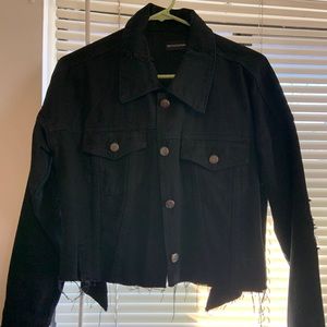 cropped and ripped black denim jacket